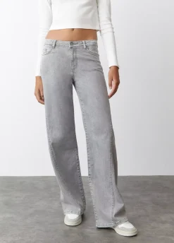 Jeans Acampanados Corte Lateral